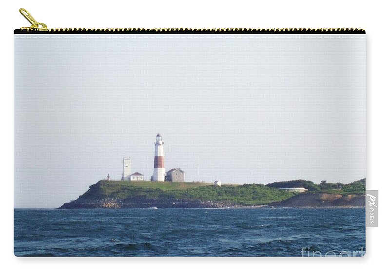 Montauk Lighthouse From The Atlantic Ocean Zip Pouch featuring the photograph Montauk Lighthouse From The Atlantic Ocean by John Telfer