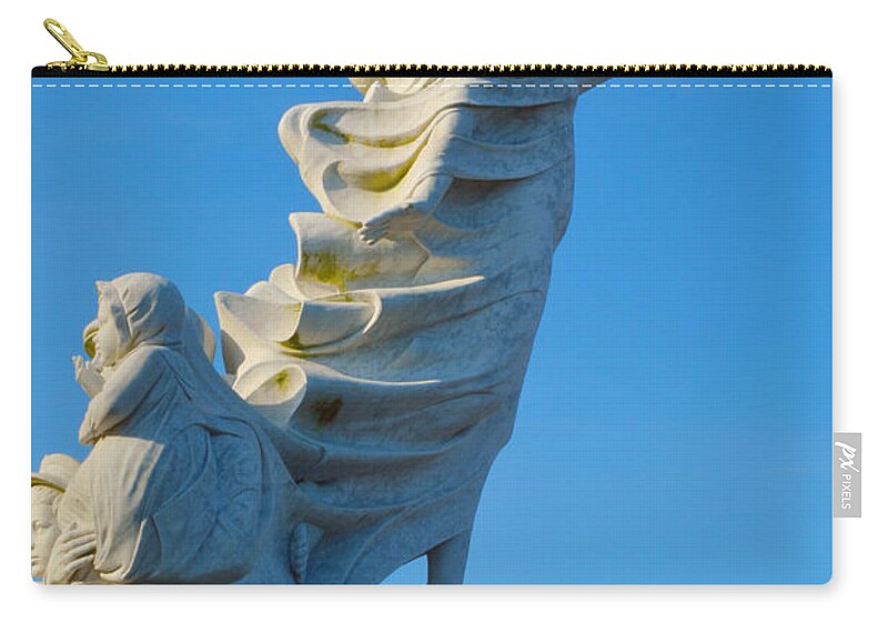 Immigrants Zip Pouch featuring the photograph Monument to the Immigrants Statue 5 by Alys Caviness-Gober
