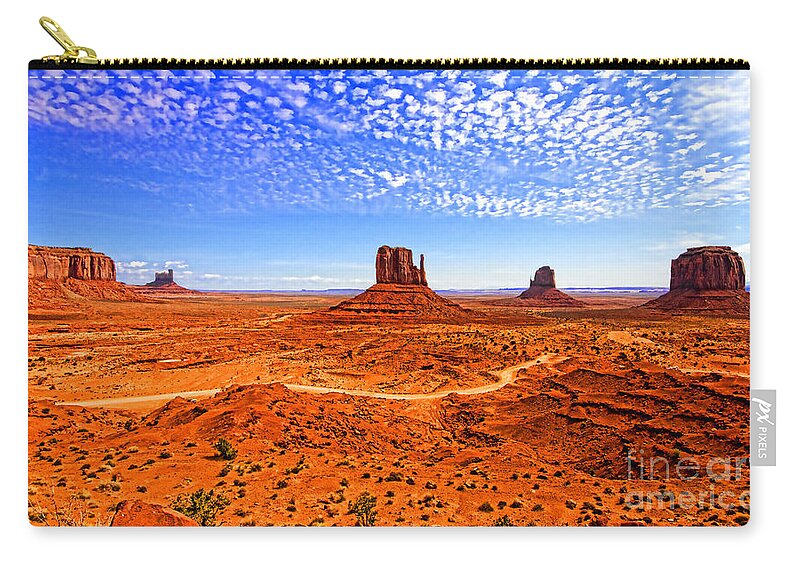 Landscape Zip Pouch featuring the photograph Monument Valley by Jason Abando