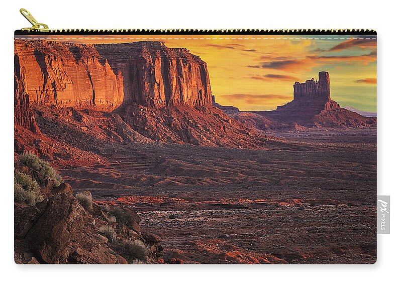 Monument Valley Sunrise Zip Pouch featuring the photograph Monument Valley Sunrise by Priscilla Burgers