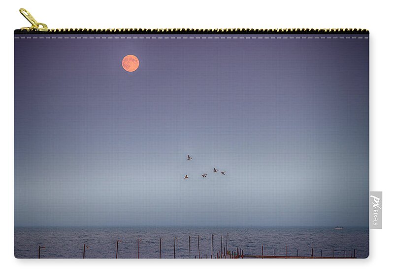 Moon Zip Pouch featuring the photograph Moon Over Lake Mille Lacs by Paul Freidlund