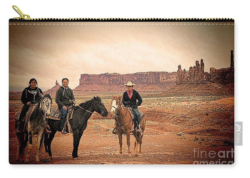 Red Soil Zip Pouch featuring the photograph Navajo Riders by Jim Garrison