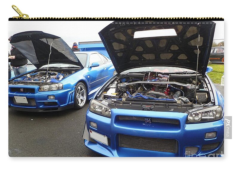 Nissan Zip Pouch featuring the photograph Nissan Skylines by Vicki Spindler