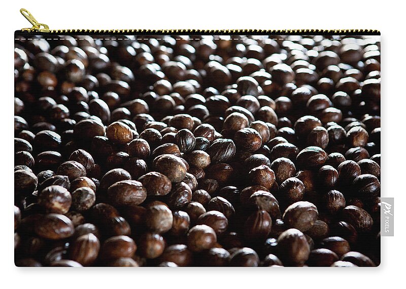 Photography Zip Pouch featuring the photograph Nutmeg Seeds, Grenada, Caribbean by Panoramic Images