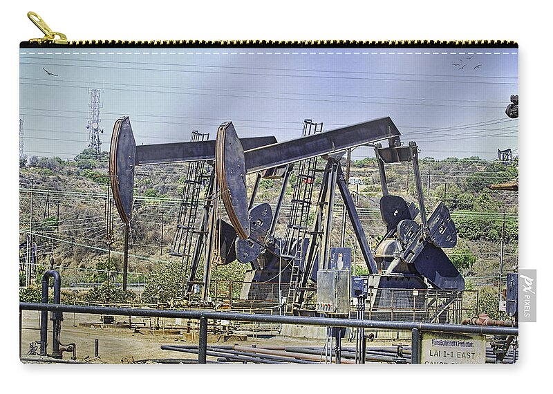 Oil Wells Pumping Zip Pouch featuring the photograph Oil Wells Pumping by Chuck Staley