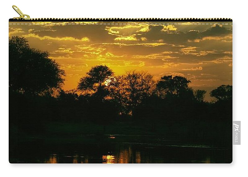 Okavango Swamp Zip Pouch featuring the photograph Okavango Sunset by Amanda Stadther