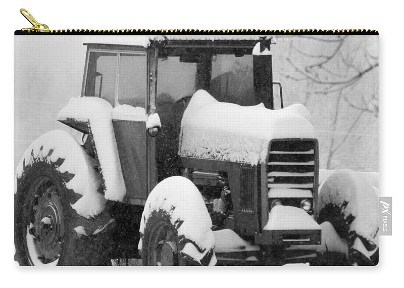 Snow Zip Pouch featuring the photograph Old Tractor in the Snow by Holden The Moment