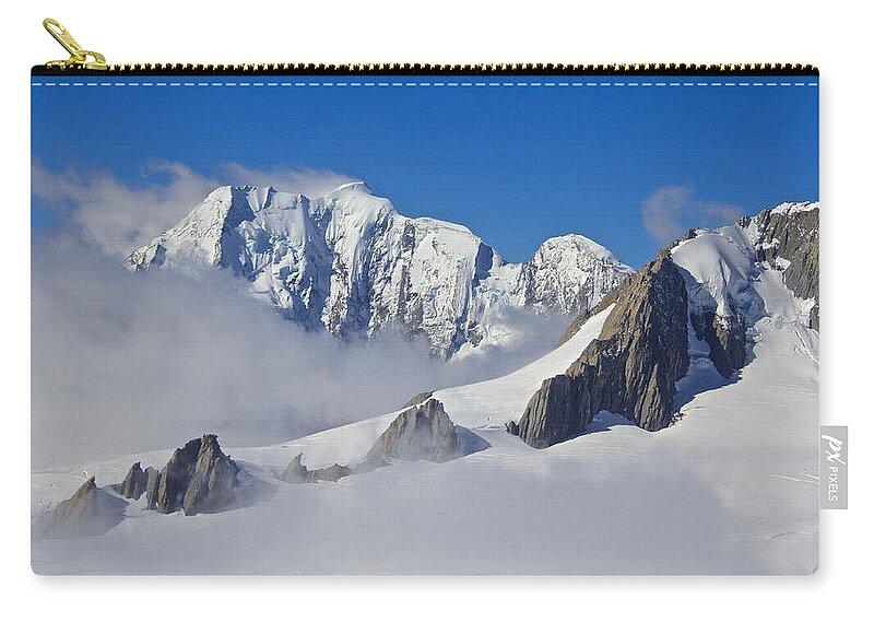 Mountain Peaks Zip Pouch featuring the photograph On Top of the World, New Zealand by Venetia Featherstone-Witty