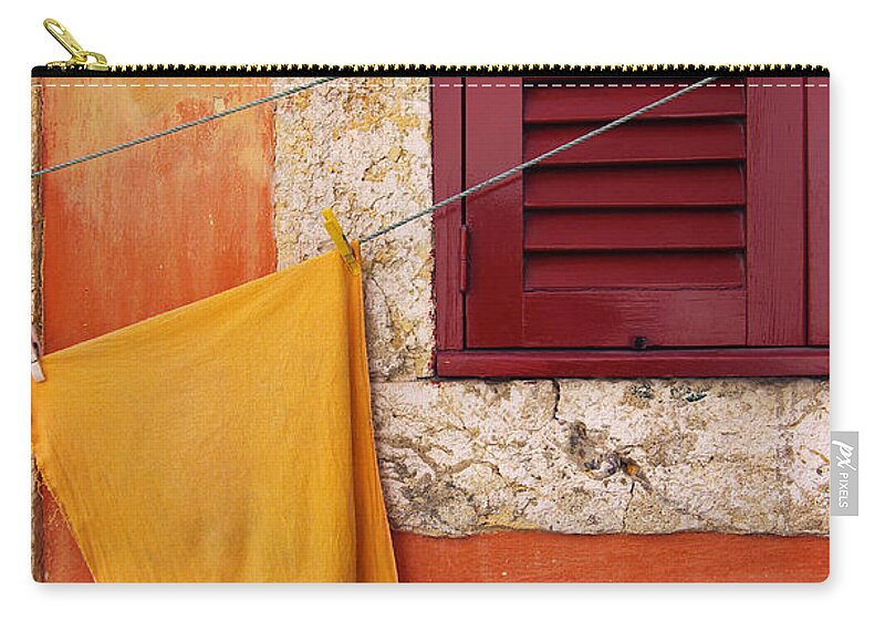 Aged Zip Pouch featuring the photograph Orange Cloth by Carlos Caetano