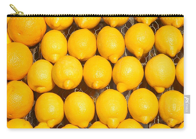 Lemon Zip Pouch featuring the photograph Oranges and Lemons by Art Block Collections