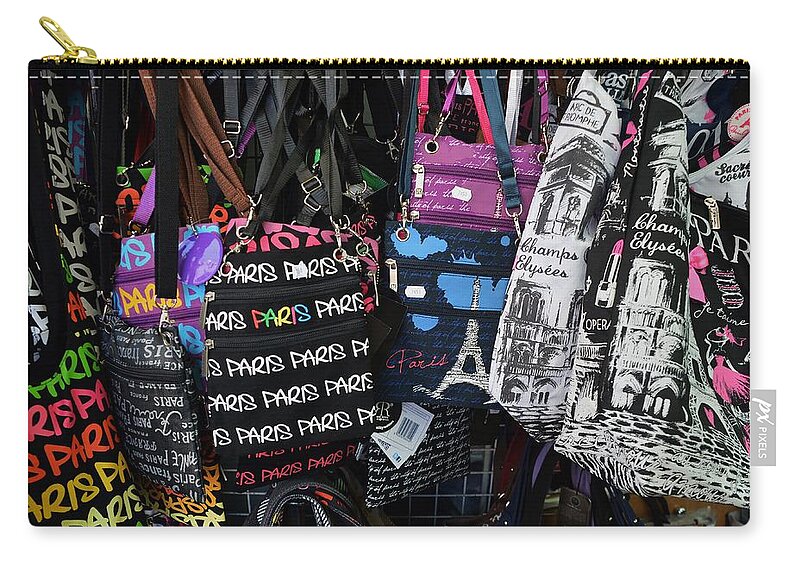 Paris Zip Pouch featuring the photograph Paris bags by Dany Lison