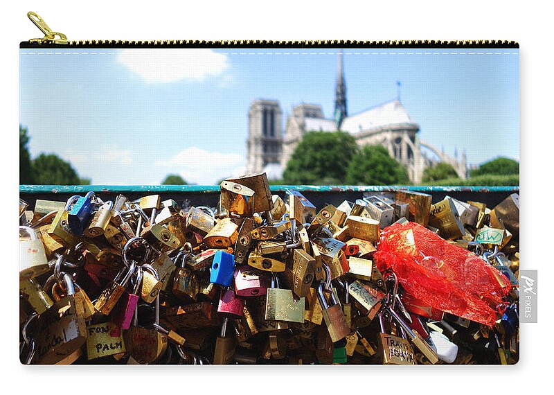 Paris Zip Pouch featuring the photograph Paris pont des arts Love Locks with Notre Dame in the background by Toby McGuire