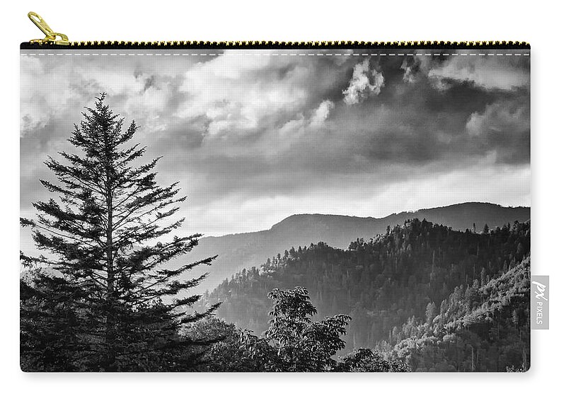 Passing Storm Zip Pouch featuring the photograph Passing Storm by Carolyn Derstine