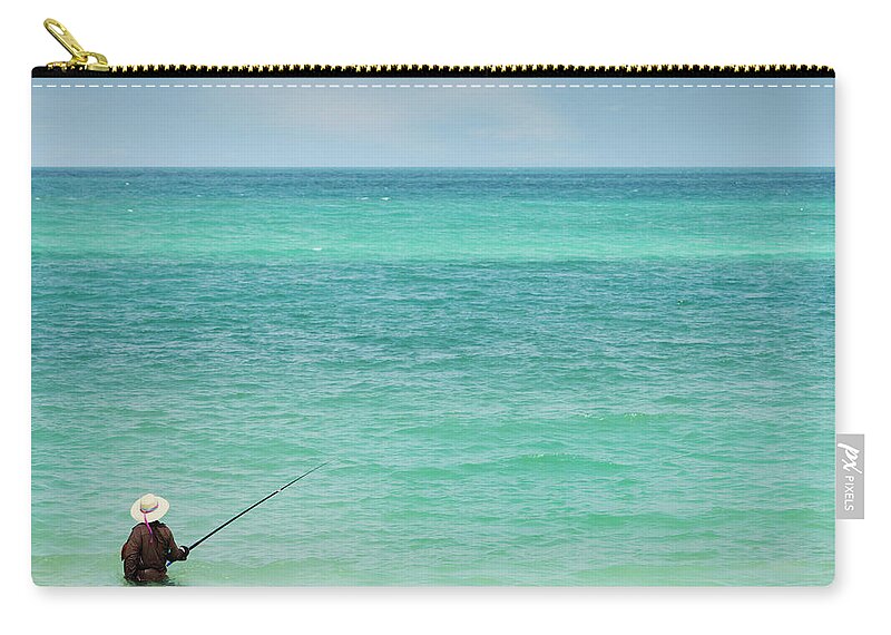 Tranquility Zip Pouch featuring the photograph Person Fishing In Ocean Off Koh Pangan by Paul Taylor