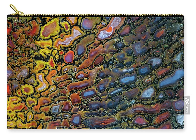 Mineral Zip Pouch featuring the photograph Petrified Dinosaur Bone Close Up by Darrell Gulin