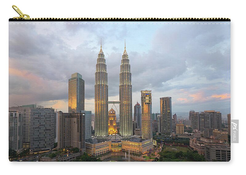 Outdoors Zip Pouch featuring the photograph Petronas Twin Towers, Kuala Lumpur by Travelpix Ltd