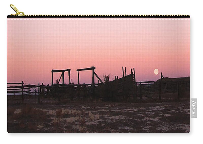 Corrals Zip Pouch featuring the photograph Pink sunset over corral by Cathy Anderson