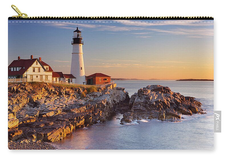 Water's Edge Zip Pouch featuring the photograph Portland Head Lighthouse, Maine, Usa At by Sara winter