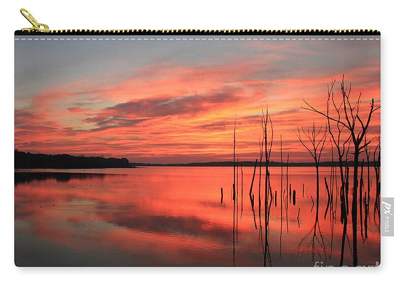 Sunrise Zip Pouch featuring the photograph Radiant Rise by Roger Becker