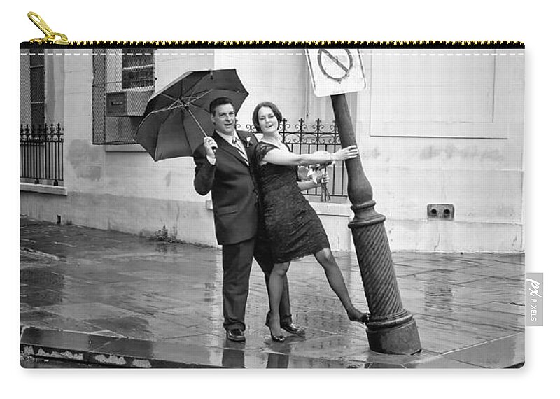 Bride Zip Pouch featuring the photograph Rainy Day at Pirates Alley Lamppost-bw by Kathleen K Parker