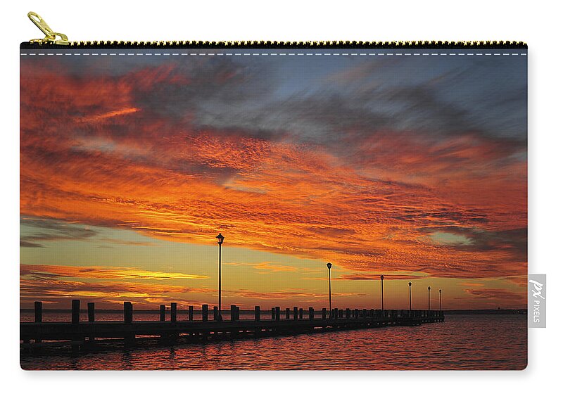 Red Sky Zip Pouch featuring the photograph Red Sunset Pier Seaside NJ by Terry DeLuco