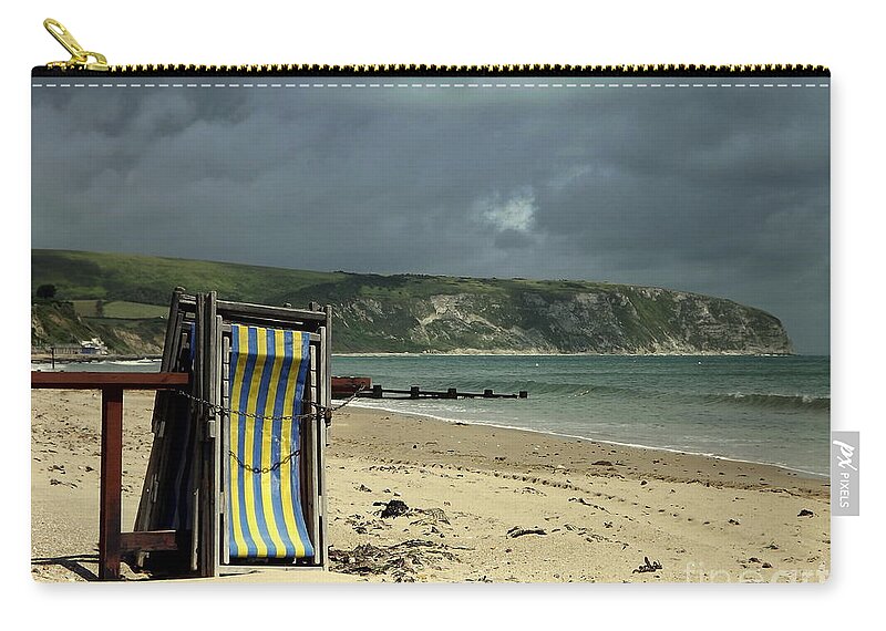 Swanage Zip Pouch featuring the photograph Redundant deck chairs by Linsey Williams