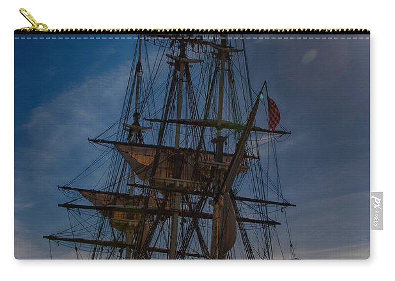 Salem Zip Pouch featuring the photograph Furling the sails by Jeff Folger