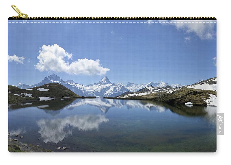 Eiger Zip Pouch featuring the photograph Reflection of Jungfrau in the Swiss Alps by Brian Kamprath