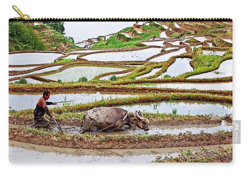 Working Animal Zip Pouch featuring the photograph Rice Paddies Of Yuanyang With Farmer by John W Banagan