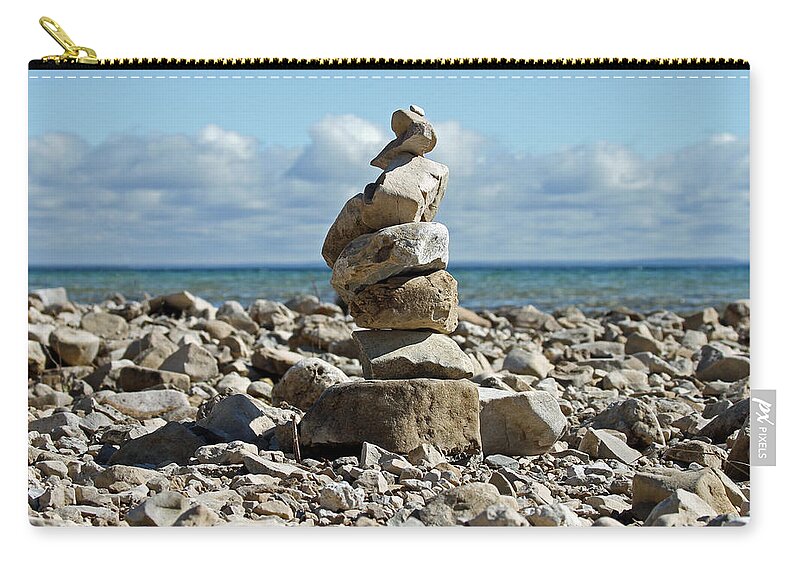 Rock Zip Pouch featuring the photograph Rock Cairn by Jackson Pearson