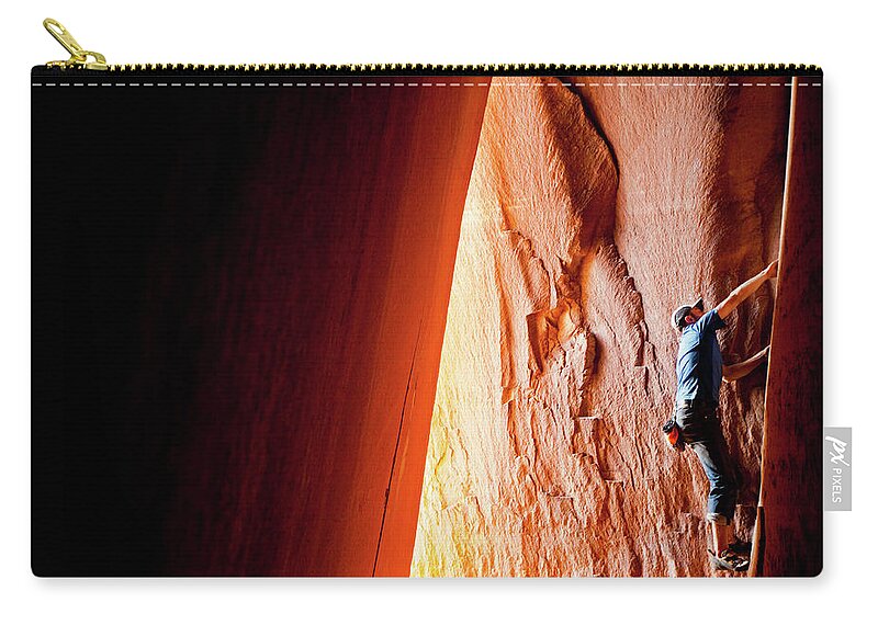 Recreational Pursuit Zip Pouch featuring the photograph Rock Climbing In Utah At Indian Creek by Epicurean