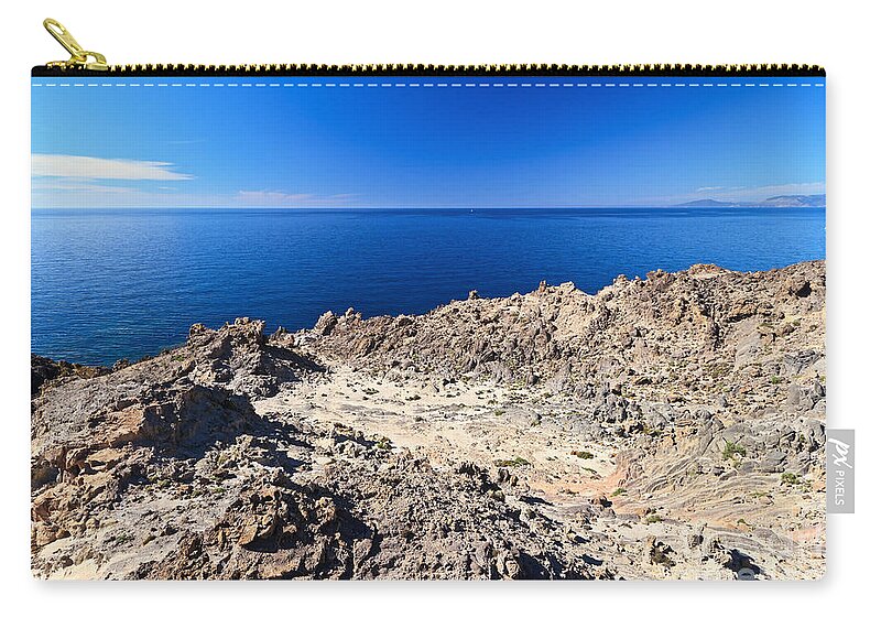 Cape Zip Pouch featuring the photograph rocky coast in San Pietro island by Antonio Scarpi