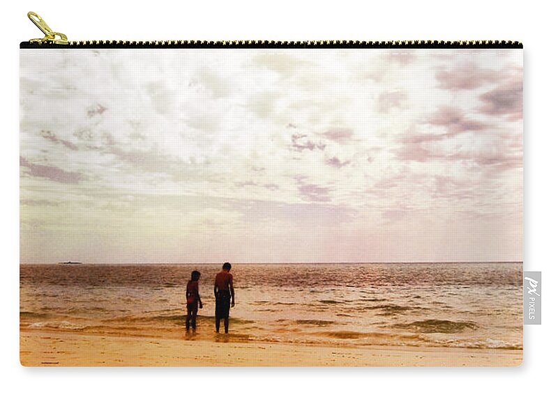 Couple; Two; Children; Sunset; Friends; Beach; Sand; Wading; Wade; Shallow; Calm; Serene; Water; Sea; Ocean; Lake; Horizon; Coast; Sky; Quiet; Outside; Outdoors; Paradise; Shore; Waves; Shoreline; Waters Edge; Blurry; Defocused; Male; Female; Boy; Girl Zip Pouch featuring the photograph Sadly by Margie Hurwich