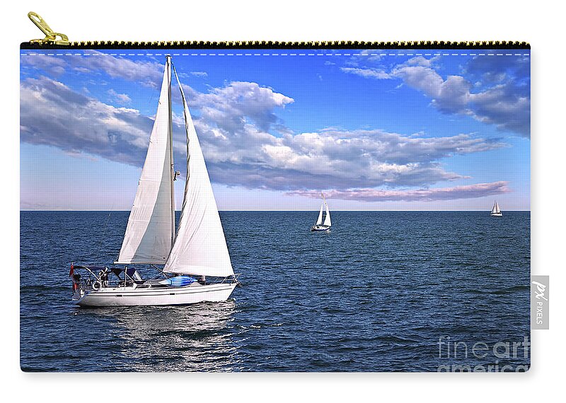 Boat Zip Pouch featuring the photograph Sailboats at sea by Elena Elisseeva