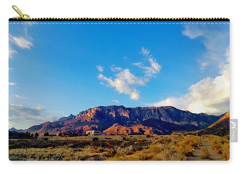 Clouds Zip Pouch featuring the photograph Sandia Foothills by Claudia Goodell