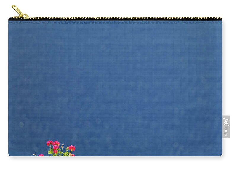 Greek Culture Zip Pouch featuring the photograph Santorini Flower by Brave-carp
