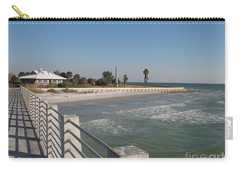 Pier Zip Pouch featuring the photograph Shadow on the Pier by Christiane Schulze Art And Photography
