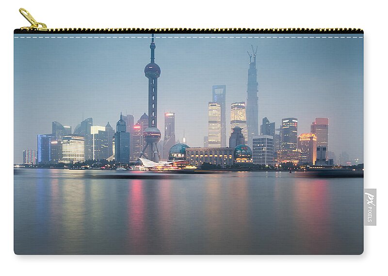 Architecture Zip Pouch featuring the photograph Shanghai Pudong skyline at sunset China by Matteo Colombo