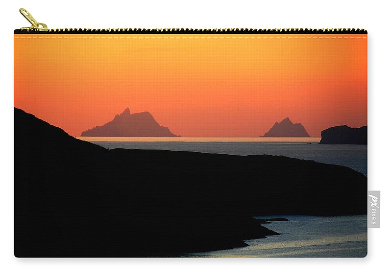 Sunset Zip Pouch featuring the photograph Skellig Islands by Aidan Moran