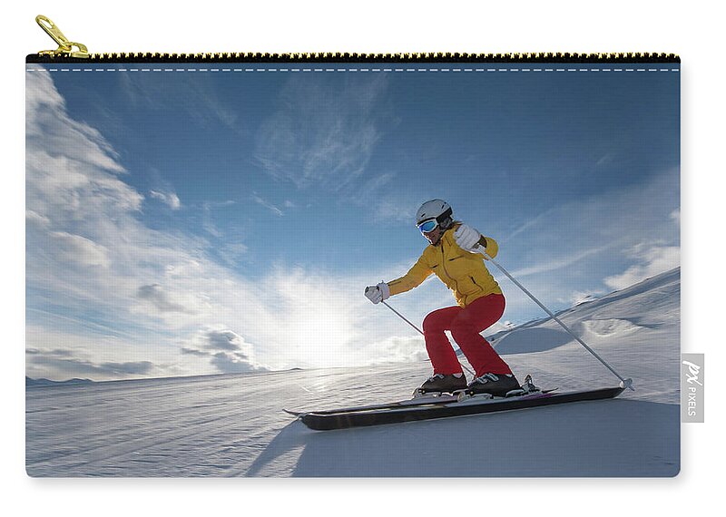 Skiing Zip Pouch featuring the photograph Skiing Winter Sport by Gorfer