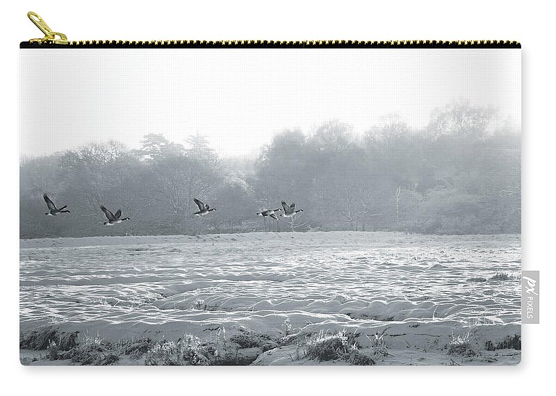 Landscape Zip Pouch featuring the photograph Snow and Geese by David Davies