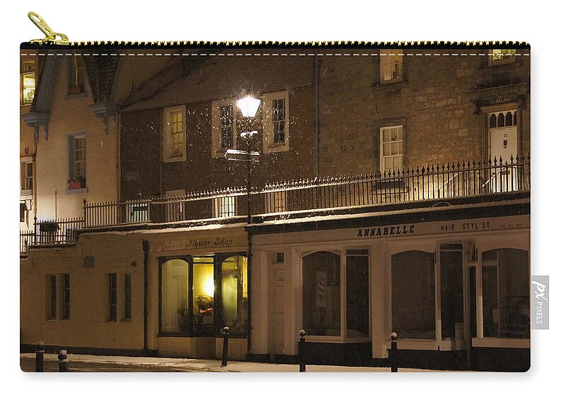 South Queensferry Main Street Zip Pouch featuring the photograph Snowy night by Elena Perelman