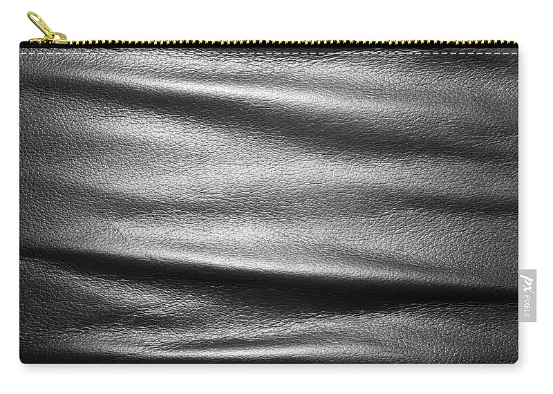 Leather Zip Pouch featuring the photograph Soft wrinkled black leather by Michal Bednarek