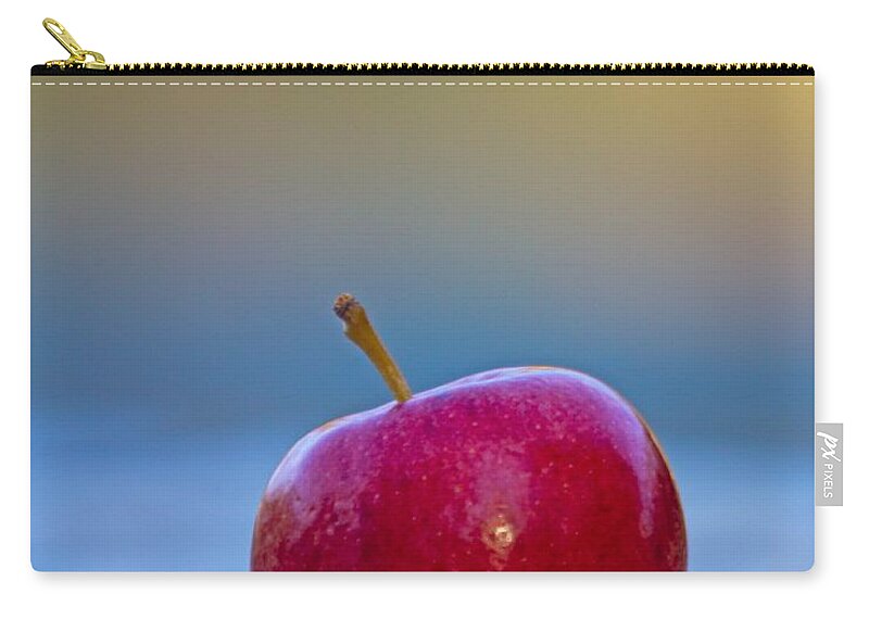 Red Zip Pouch featuring the photograph Solitary Apple by John Harmon