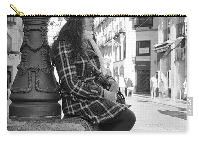 Girl Zip Pouch featuring the photograph Waiting in this Spanish street by Pablo Lopez