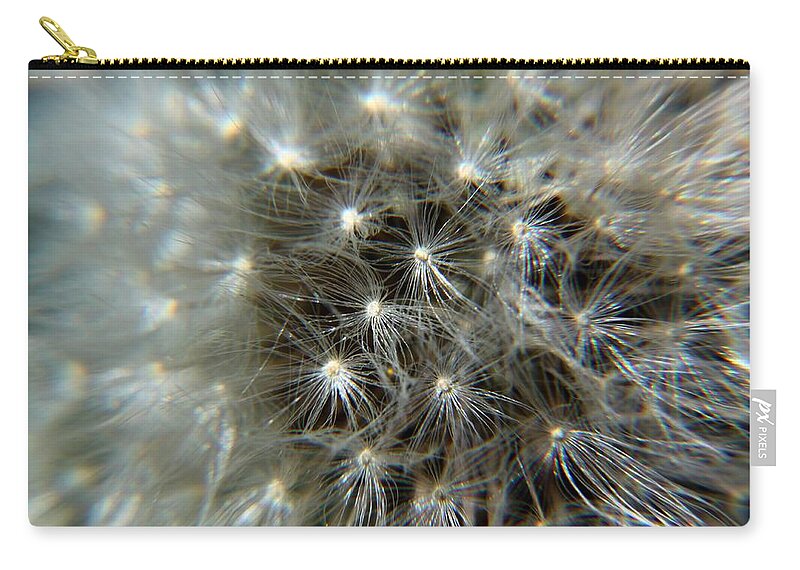 Dandelion Zip Pouch featuring the photograph Sparkler - Closeup by Ramabhadran Thirupattur