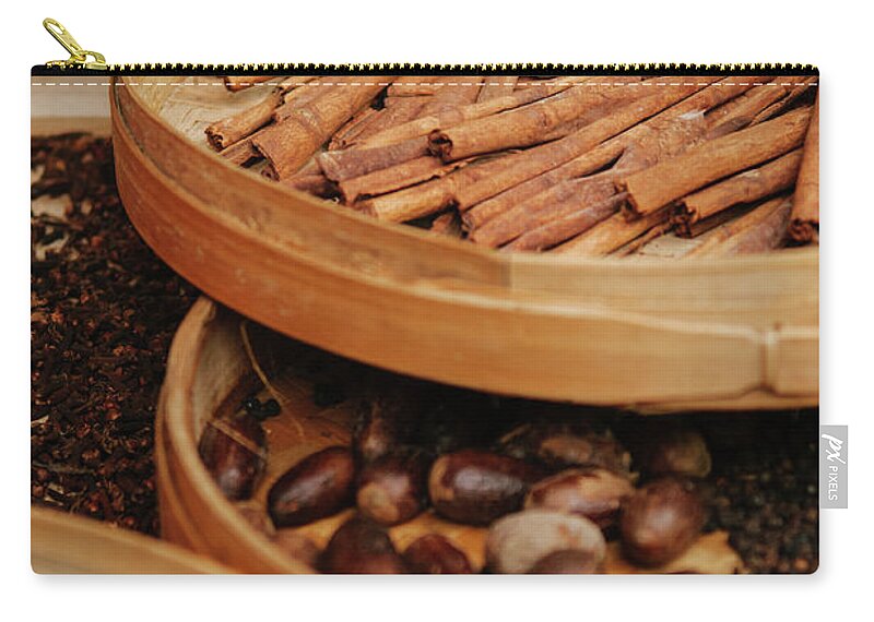 Vanilla Zip Pouch featuring the photograph Spices For Sale At A Market by Photo By Sam Scholes