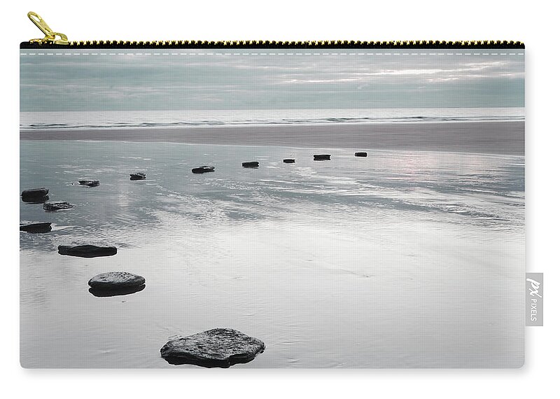 Tranquility Zip Pouch featuring the photograph Stepping Stones Over Water On Beach by Peter Cade