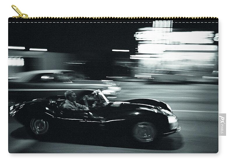 Steve Mcqueen Carry-all Pouch featuring the photograph Steve McQueen Jaguar XK-SS on Sunset Blvd by Georgia Fowler
