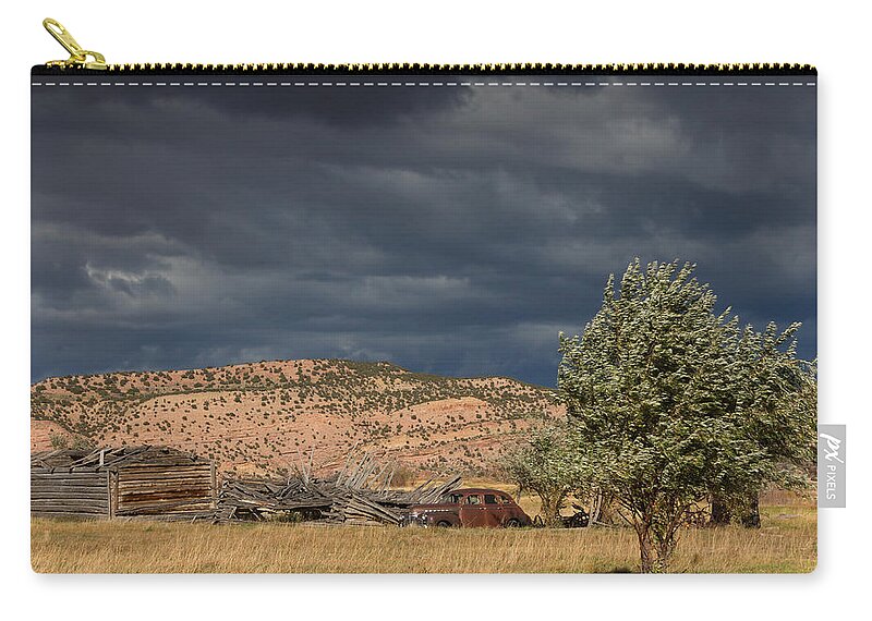 Chevrolet Zip Pouch featuring the photograph Storm Whipping Desert Homestead by Kathleen Bishop